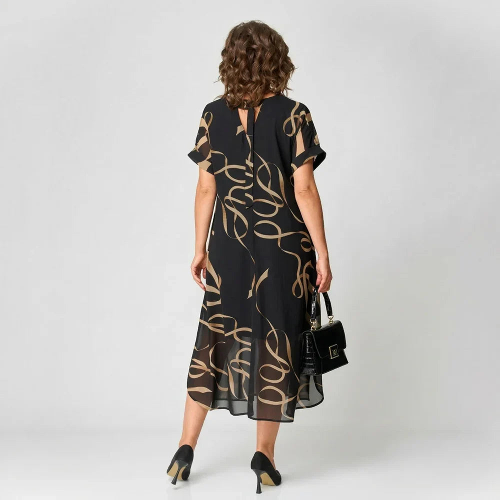 Francisca - Vestido con volantes y estampado dorado