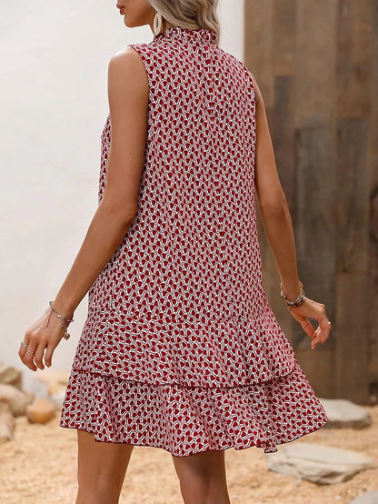 Inés - Elegant printed sleeveless dress with a flowing drape