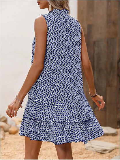 Inés - Elegant printed sleeveless dress with a flowing drape