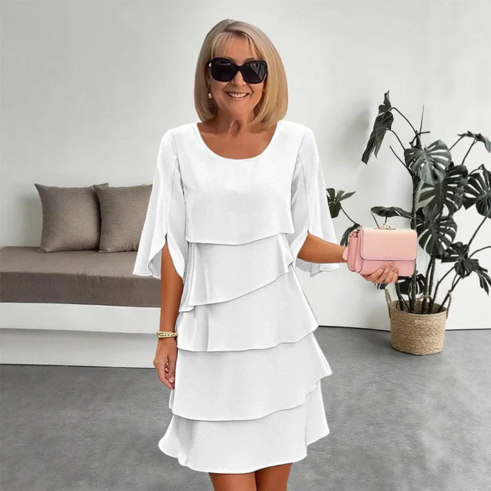 Brisa - Vestido elegante con capas y volantes