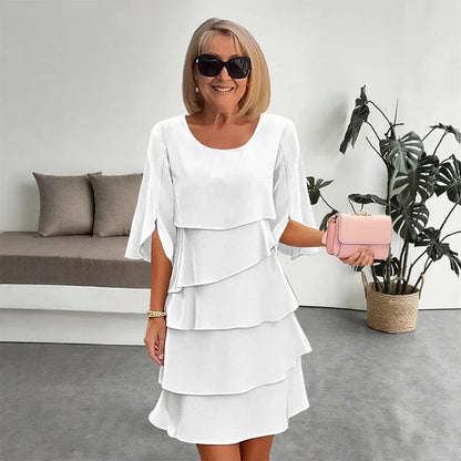 Brisa - Vestido elegante con capas y volantes