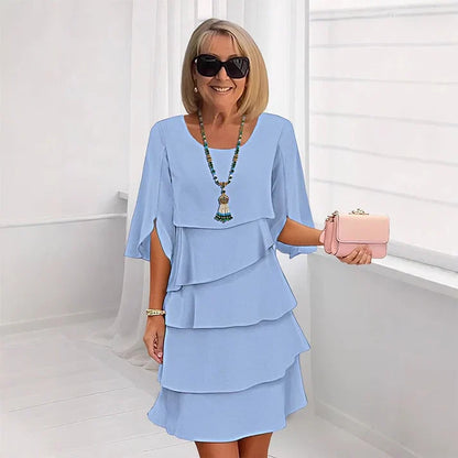 Brisa - Vestido elegante con capas y volantes