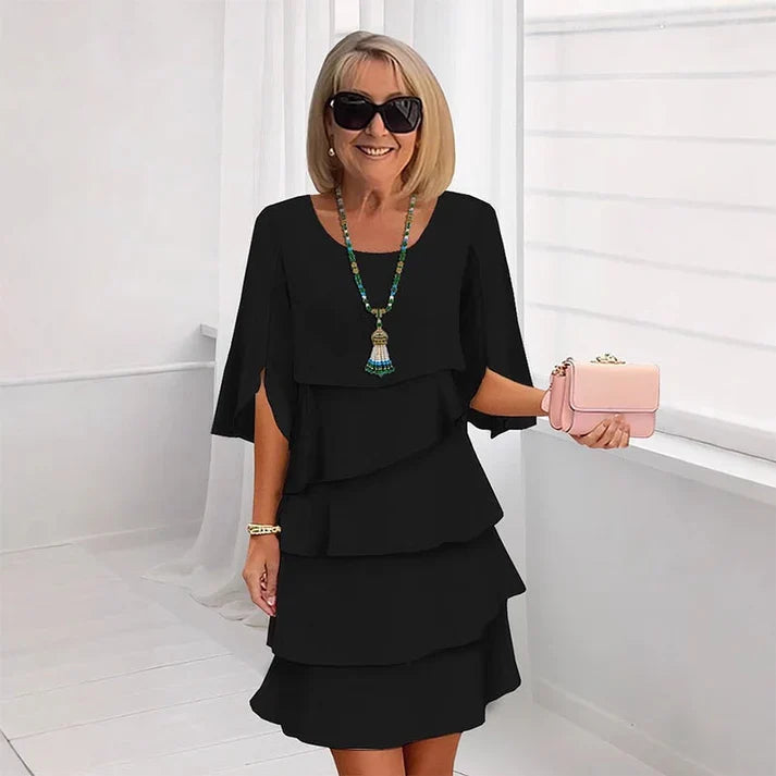 Brisa - Vestido elegante con capas y volantes