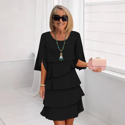 Brisa - Vestido elegante con capas y volantes